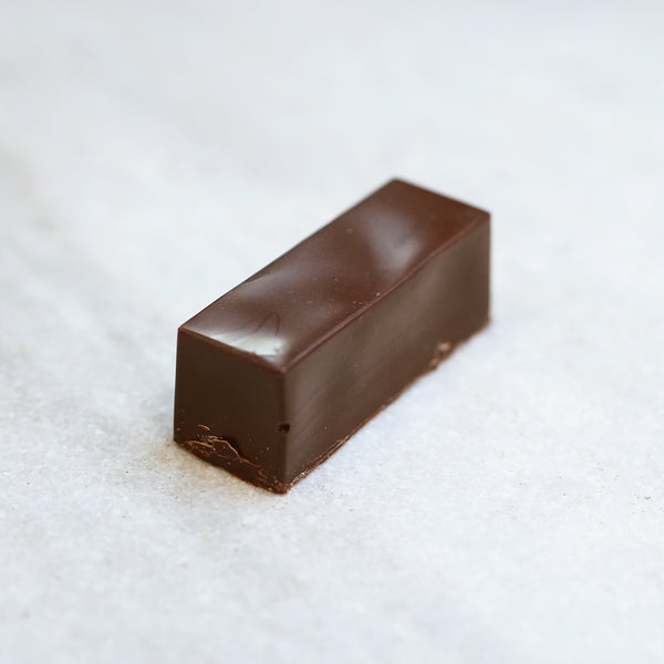Tempered Chocolate rectangular coconut almond chocolate bar.